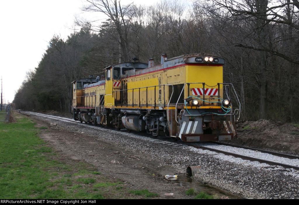 With time and money invested by the new owners, the track of the West Michigan Railroad is starting to look better as 1416 heads for the transload